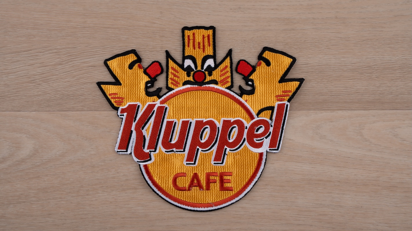 Kluppelcafé embleem groot