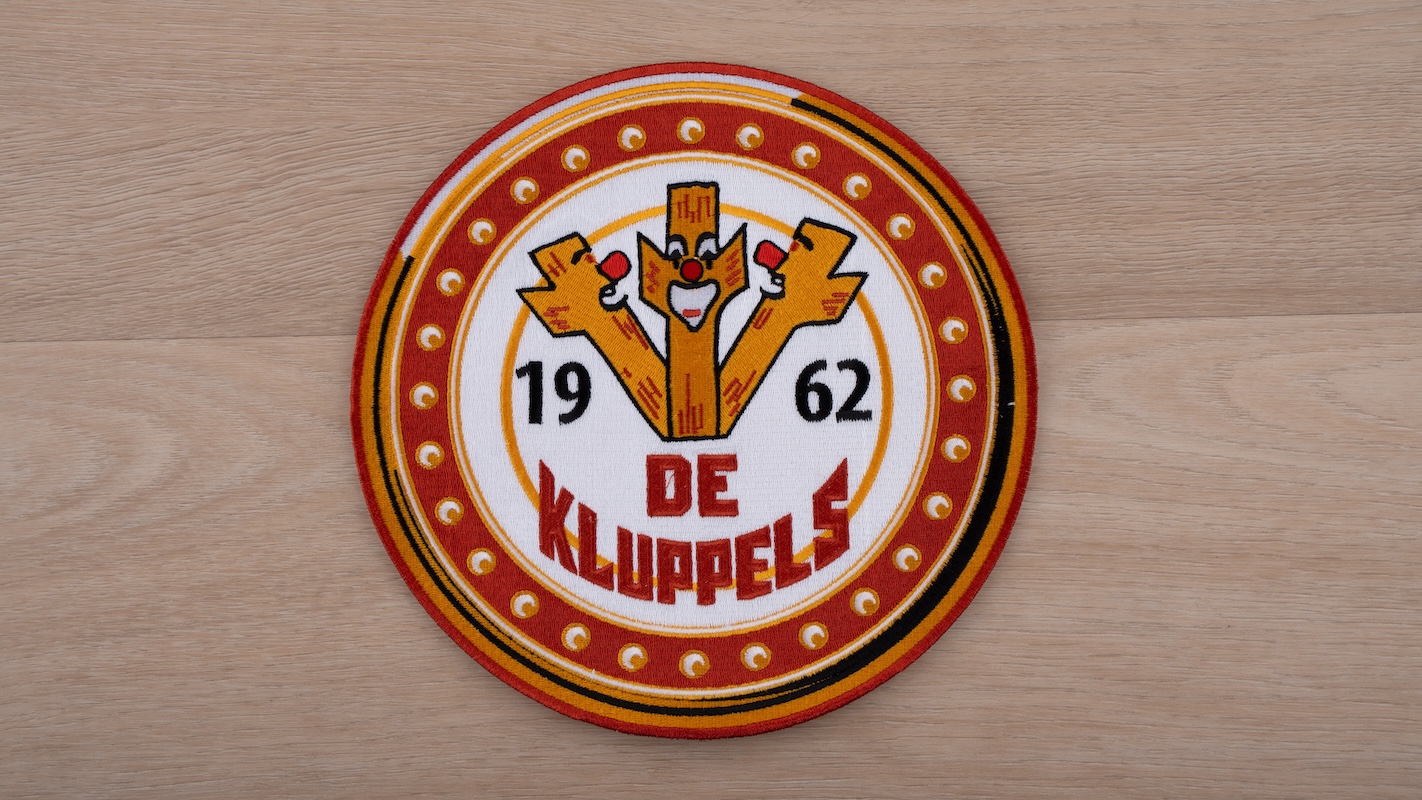 Kluppelschild groot rugembleem